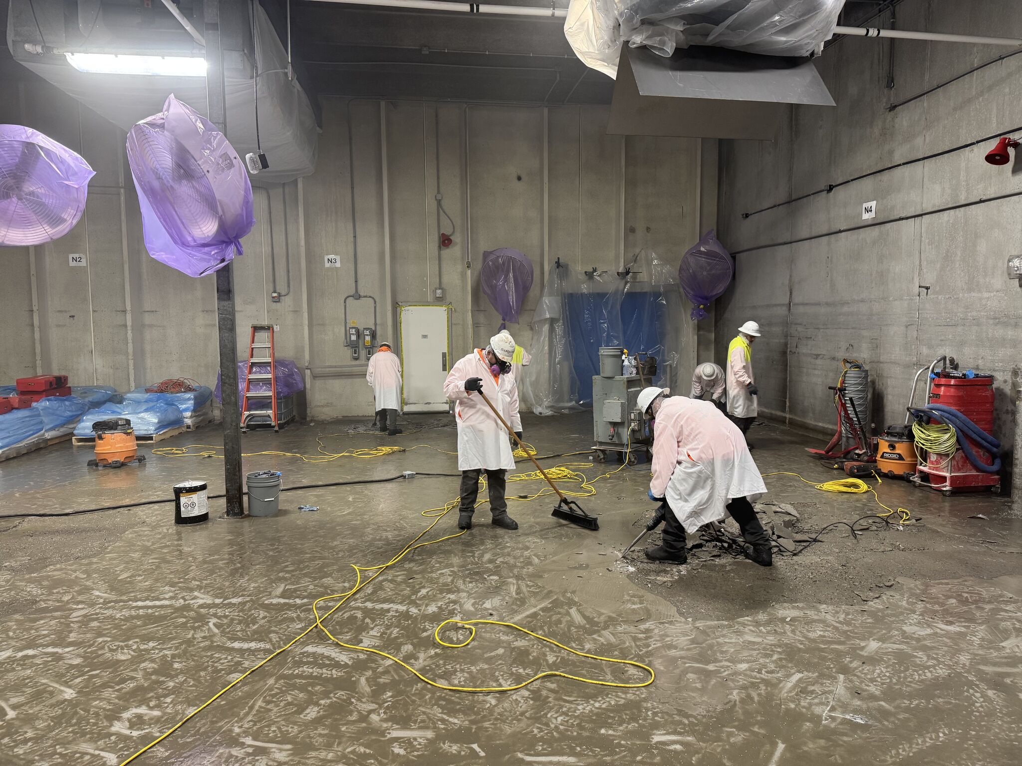 SaniCrete crew finishing wet STX in a blast freezer