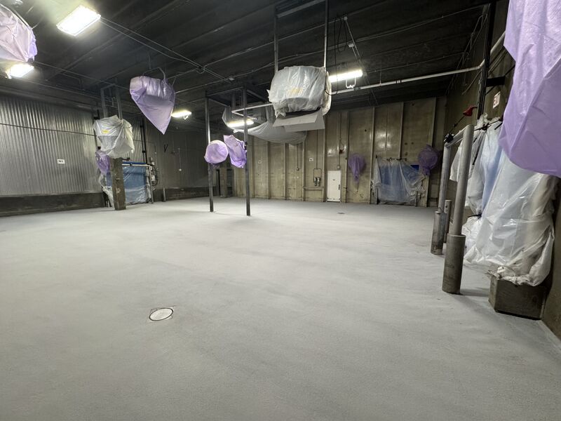 Finished SaniCrete STX blast freezer floor with cove at the walls