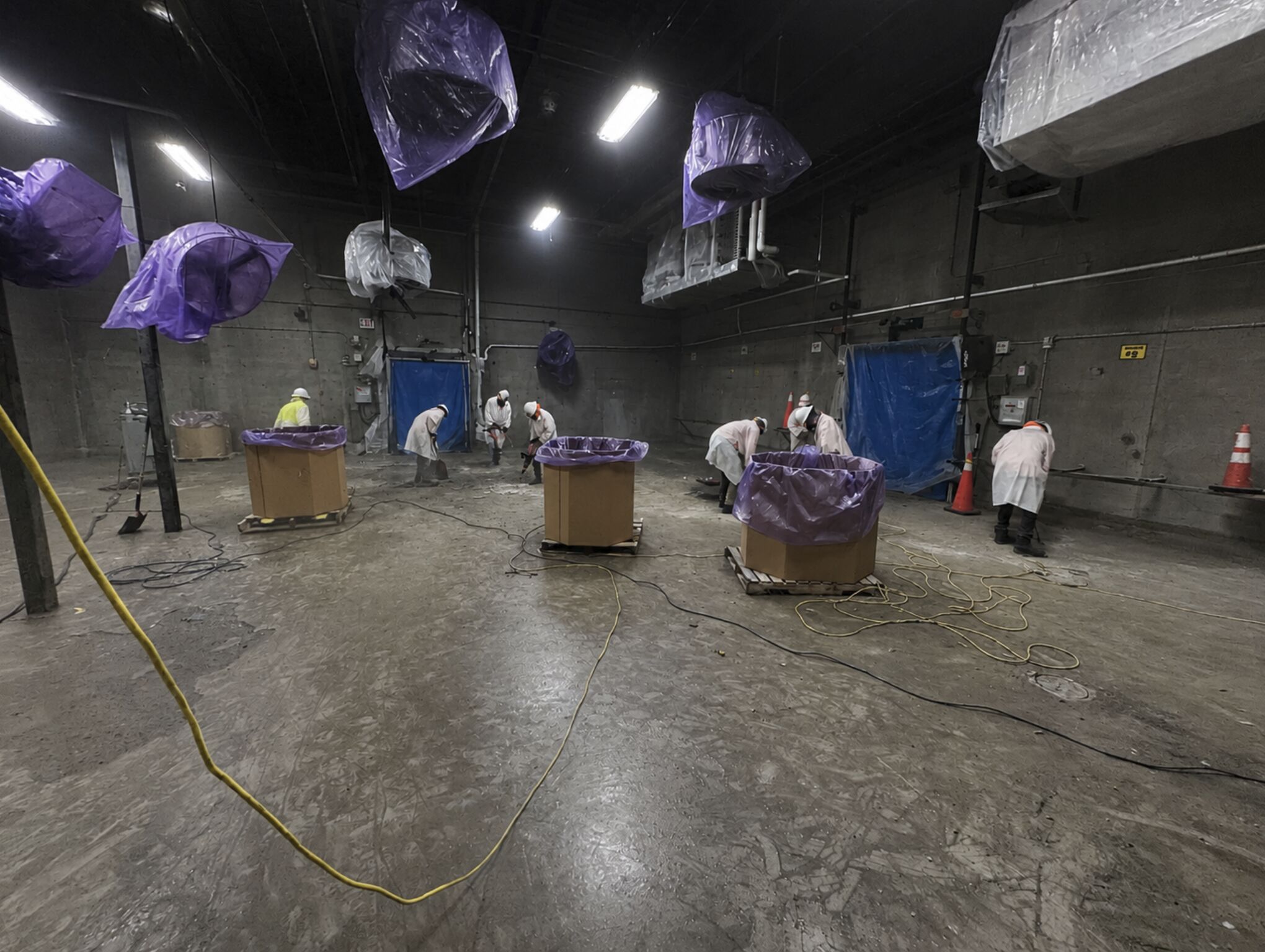 Fresh SaniCrete STX being installed across a blast freezer floor