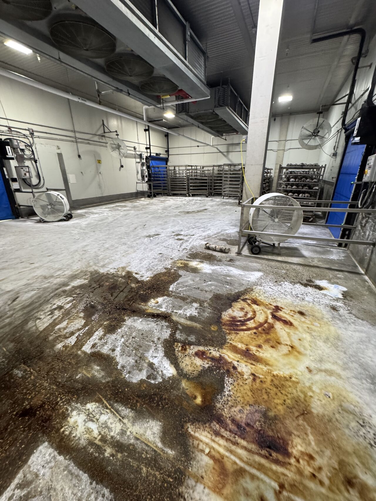 Deteriorated blast freezer floor area before SaniCrete repair