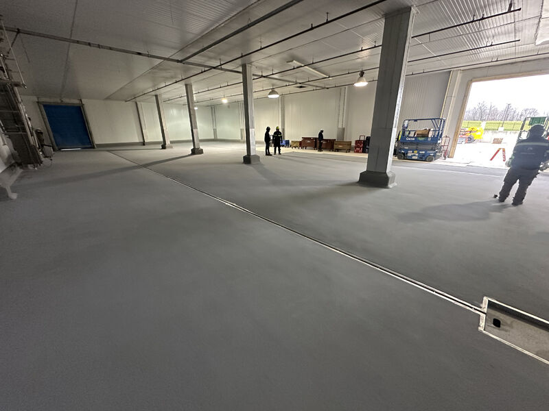Poultry processing facility cooler converted to new processing area with SaniCrete resinous flooring