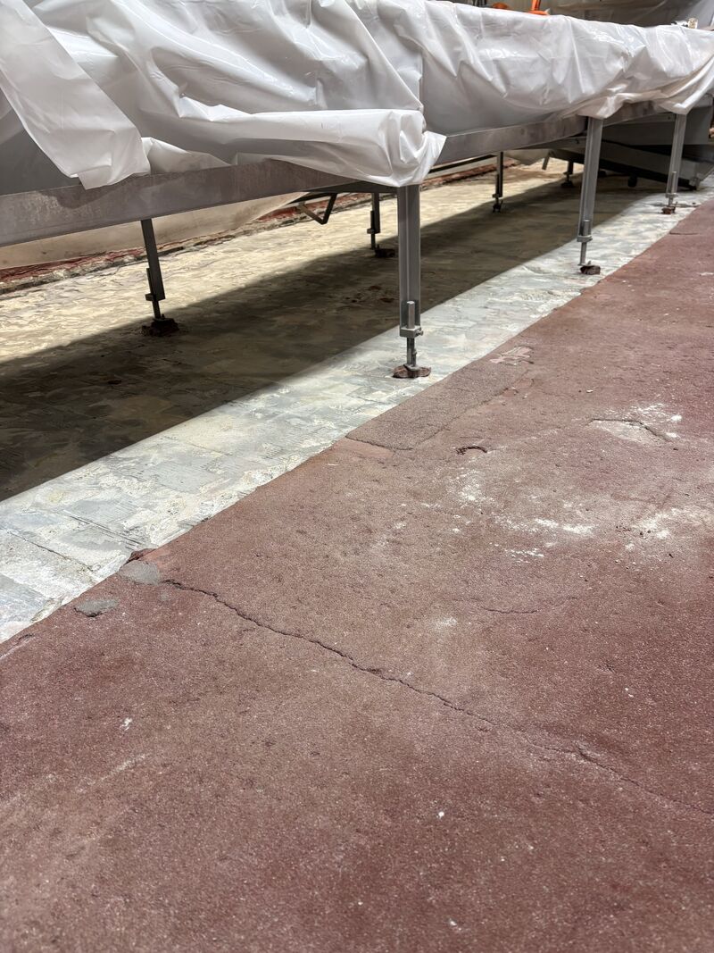 Finished SaniCrete STX urethane cement floor under food processing conveyors