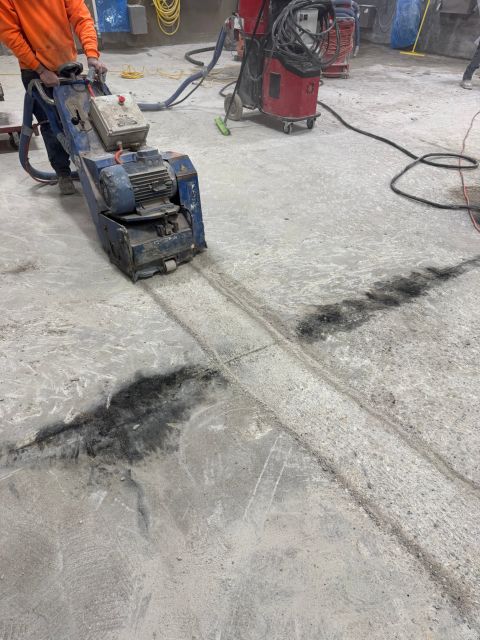 Mechanical surface preparation on exposed concrete after failed coating removal