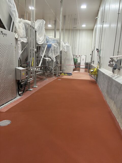 SaniCrete STX urethane cement installation after removing a failed floor
