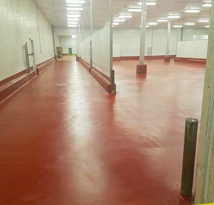 SaniCrete PC protective urethane cement sealcoat coating applied to food processing floor