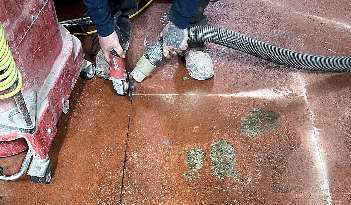 Preparing and keying damaged concrete edges for SaniPatch