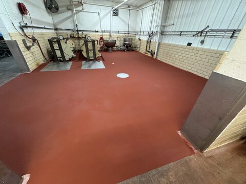 Finished resinous flooring repair in a production or cooler area