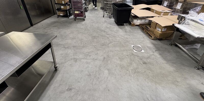 Long view of older SaniCrete cheese processing floor